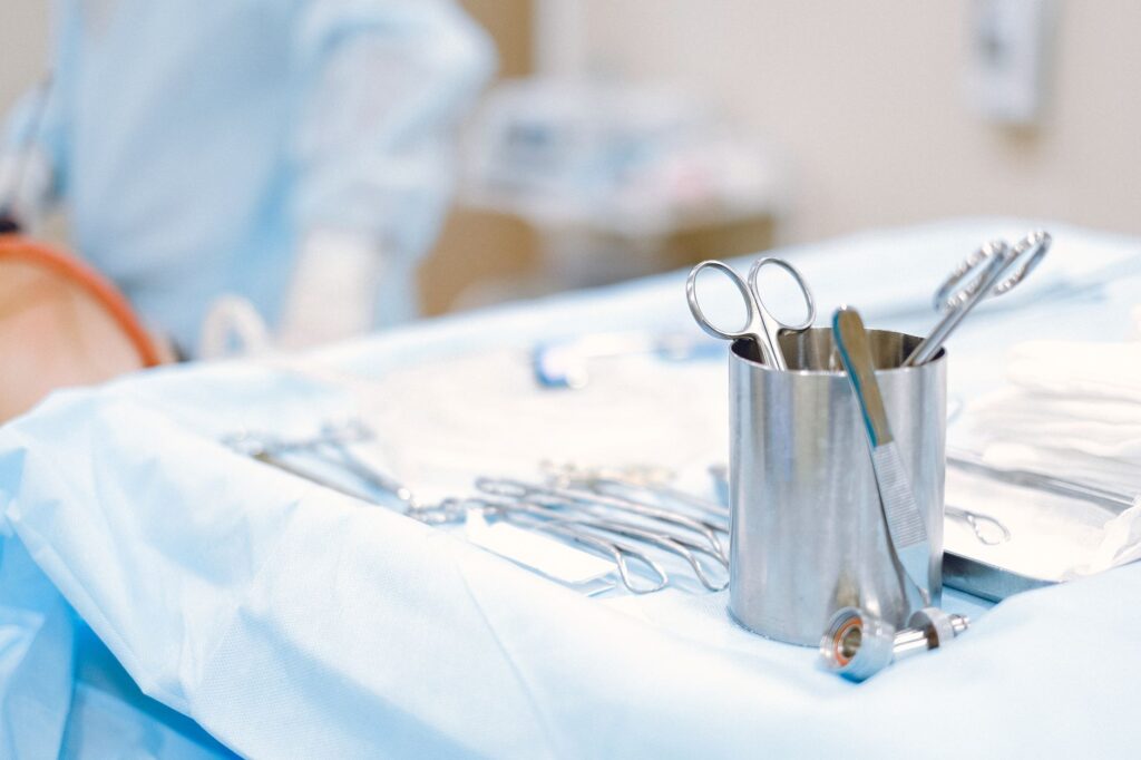 Surgical instruments arranged on a sterile table in an operating room