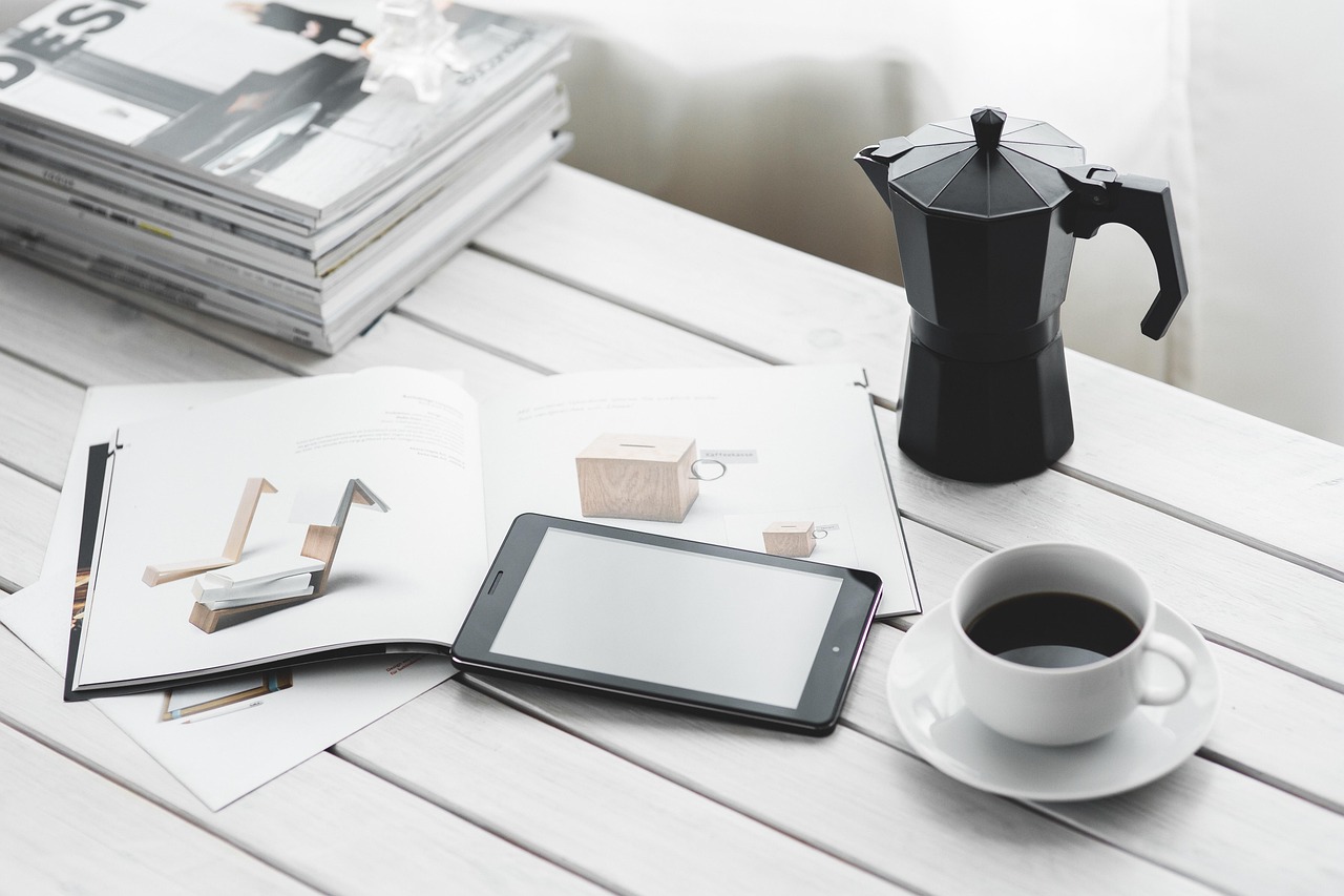 Technology, tablet, coffee cup — Experience Deep Relaxation with Tantric Massage Outcall in London