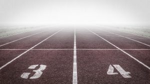 Running track, numbers, fog — Hair Transplant: A permanent approach to hair loss solutions.