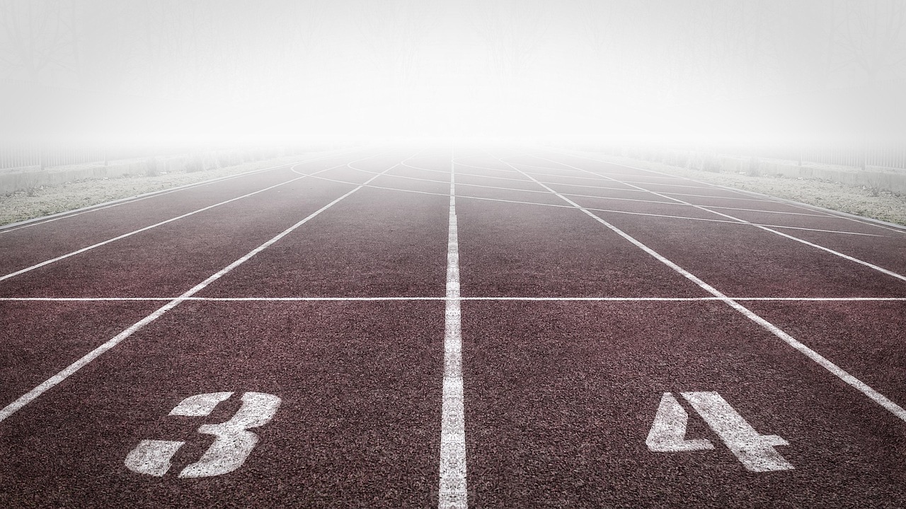 Running track, numbers, fog — Hair Transplant: A permanent approach to hair loss solutions.
