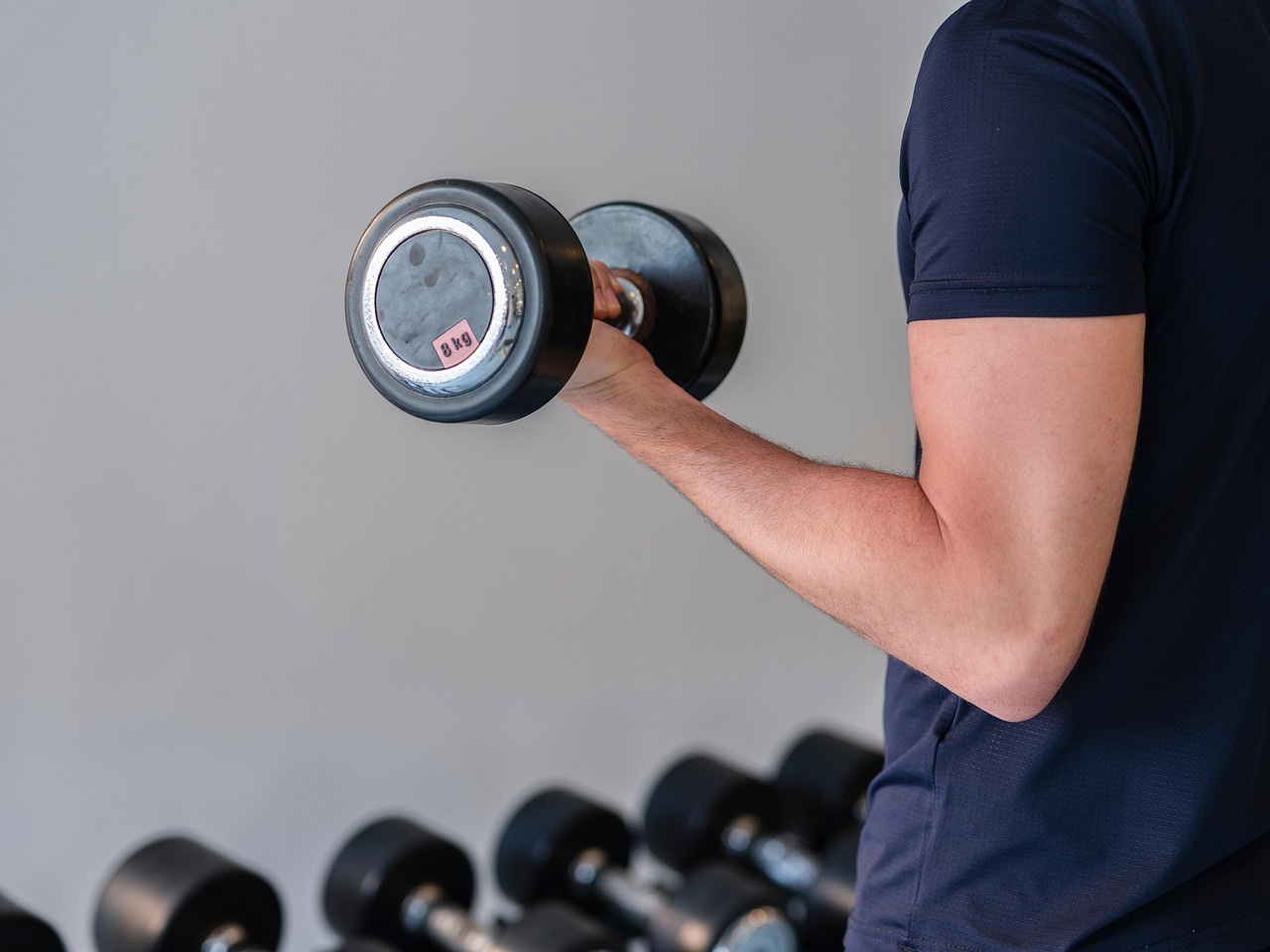 Weight, dumbbell, strength — Navigating the French Life Insurance Market: Key Considerations for Expatriates